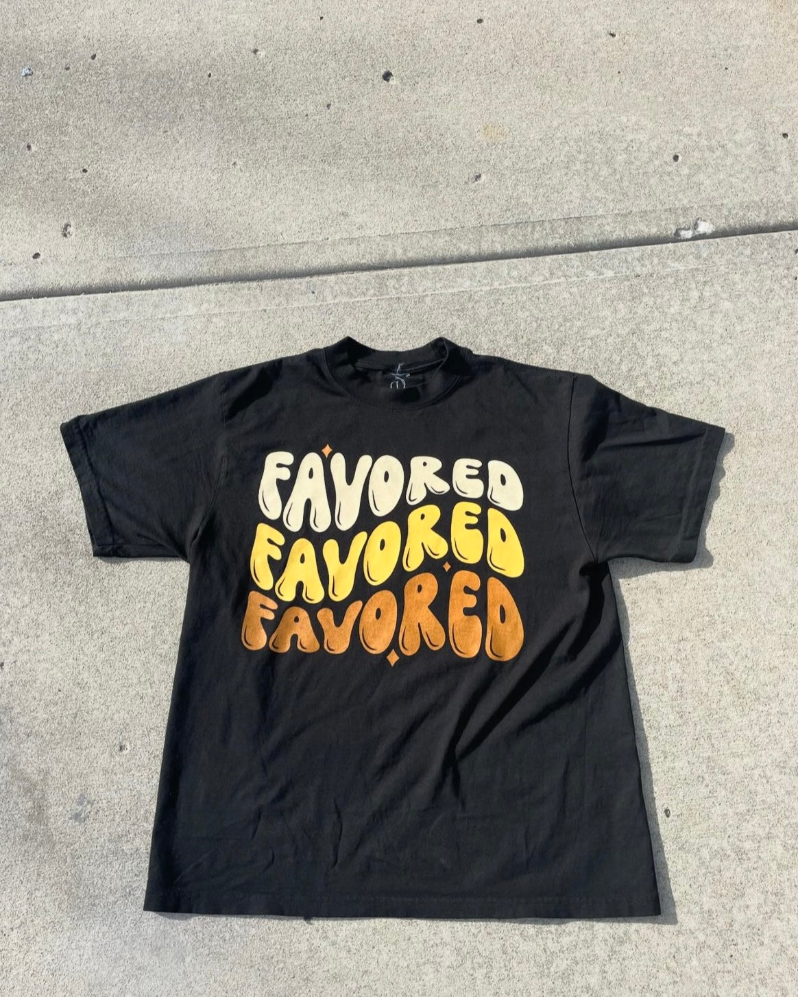 “Favored” tee